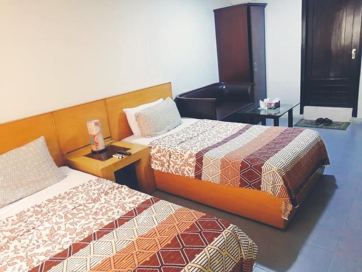 Hotel Rooms Dha Karatschi Zimmer foto