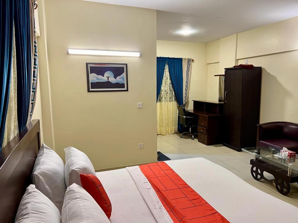 Hotel Rooms Dha Karatschi Exterior foto