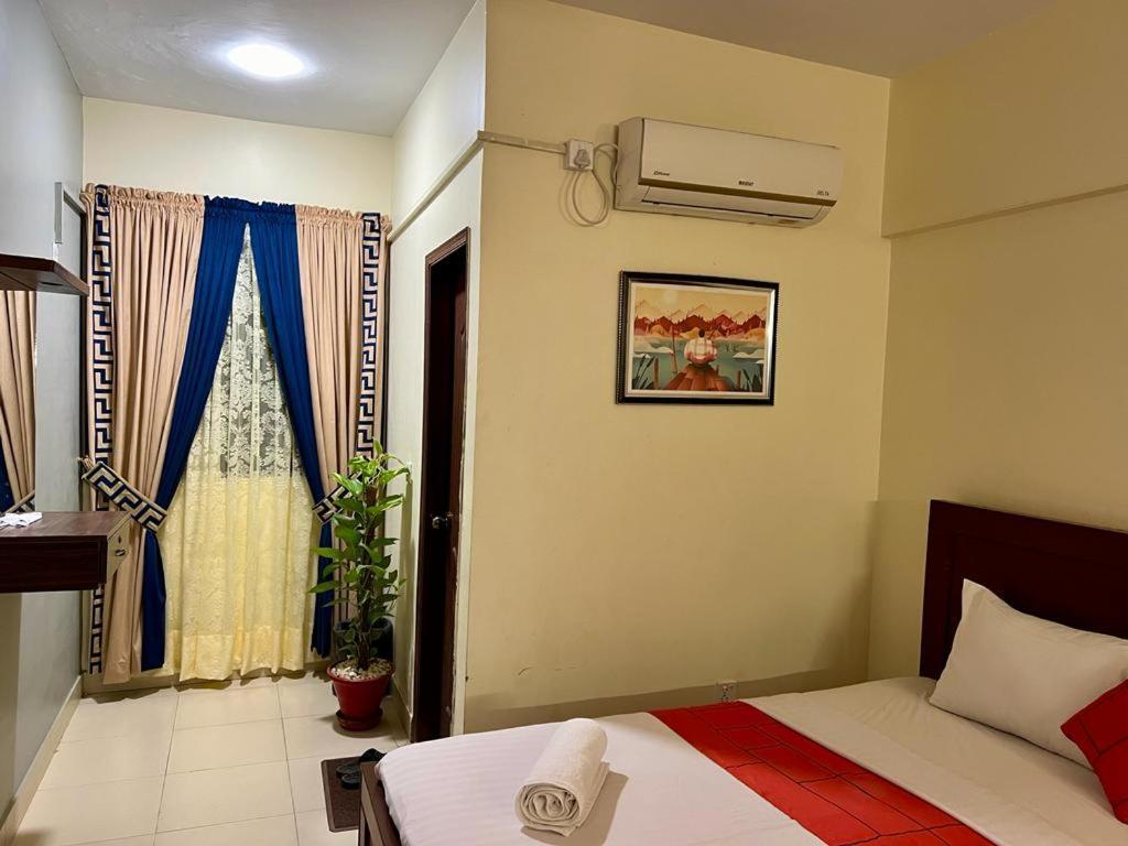 Hotel Rooms Dha Karatschi Exterior foto