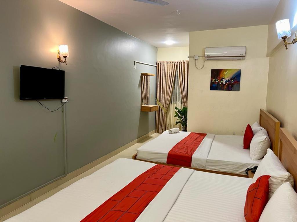 Hotel Rooms Dha Karatschi Exterior foto